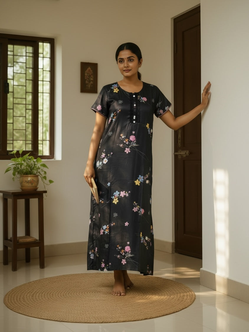 Kishona black maxi nightgown with multi-coloured floral print, short sleeves, button-down placket, and lace detailing.