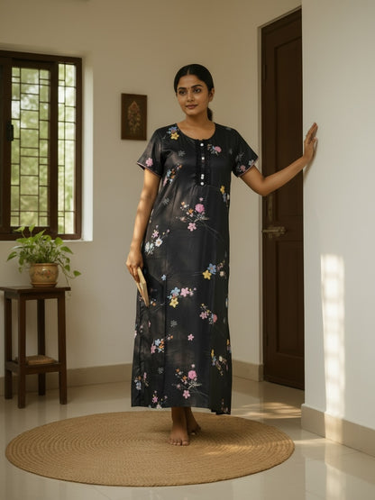 Kishona black maxi nightgown with multi-coloured floral print, short sleeves, button-down placket, and lace detailing.