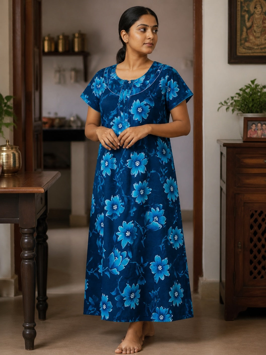 Kishona floral print cotton maxi nighty in deep blue with light blue flowers, round neck, and button-down placket.